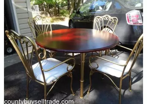 beautiful mahogany table with four chairs